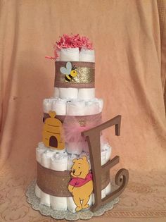 a winnie the pooh diaper cake on display