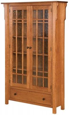 a wooden china cabinet with glass doors