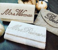 three personalized towels and two pumpkins on the floor