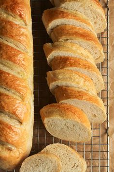 several loaves of bread on a cooling rack