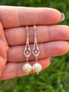 These are beautiful bridal earrings.  Made to order, fast shipping! 💕rose gold plated over brass components with cubic zirconia crystals, Swarovski  cream pearls 💕earrings are approx 2 inches or 5 cm  top to bottom  Thank you so much for your custom! Rose Gold Cubic Zirconia Pearl Earrings For Anniversary, Elegant Rose Gold Drop Bridal Earrings, Elegant Rose Gold Bridal Drop Earrings, Classic Rose Gold Bridal Earrings, Rose Gold Cubic Zirconia Bridal Earrings For Formal Events, Rose Gold Cubic Zirconia Bridal Earrings For Formal Occasions, Formal Rose Gold Bridal Earrings With Cubic Zirconia, Elegant Rose Gold Earrings For Wedding, Rose Gold Elegant Bridal Earrings