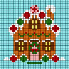 a cross - stitch christmas ornament in the shape of a gingerbread house