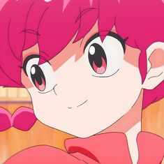 a close up of a person with pink hair and big eyes looking off to the side