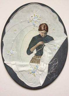 a woman is stitching something on a piece of cloth that has been embroidered onto it