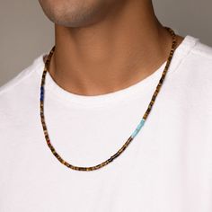 This unique necklace with Blue Lapis, Brown Tiger Eye, and Turquoise Heishi beads is the perfect summer style. The colors are reminiscent of a Caribbean beach while the red accents give this necklace a pop that ties all colors together perfectly. Avoid direct contact with perfume, body lotions, hair spray and other chemicals Remove your jewelry before going to bed Avoid direct sunlight, heat or cold, especially stay out of humidity Remove jewelry when bathing, showering and swimming Remove jewel Heishi Necklace, Brown Tiger, Caribbean Beach, Brown Tiger Eye, Before Going To Bed, Body Lotions, Going To Bed, Boho Luxe, Hair Spray