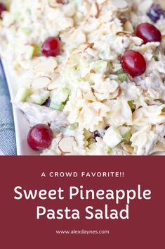 sweet pineapple pasta salad with cherries and almonds in a white serving dish