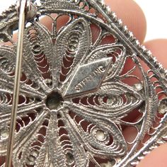 925 Sterling Silver Vintage Filigree Floral Design Pin Brooch Weight: 12.1g WELCOME TO PAWN SHOP We are an actual pawn shop and have been in business for over 25 years. Since 1990, our establishment has been serving a variety of clients by providing them with short term cash solutions and options of liquidity regarding their treasured heirlooms. Acknowledging that today′s customers are very sophisticated and are looking for a variety of investments, our acquisitions are hand-picked for our speci Vintage Filigree Brooches For Anniversary, Antique Silver Brooches With Intricate Design, Ornate Filigree Brooches For Collectors, Silver Filigree Sterling Silver Brooch, Silver Filigree Brooches For Collectors, Ornate Silver Engraved Brooches, Vintage Silver Brooch With Intricate Design, Vintage Filigree Pendant Brooch, Collectible Silver Filigree Brooches