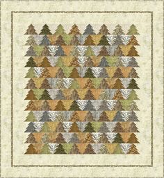 a quilt with many trees on it