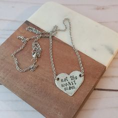 D E T A I L SYou will receive 1 hand stamped necklace that reads 'not the worst mom'The heart charm is approximately 1" across x .8" high and is attached to a 18" stainless steel cable chain - if you would prefer a longer length, please include a note in the notes to seller at checkout. The hand stamped heart charm is made of pewter. These charms are hand formed and have an organic shape and texture, no two are exactly alike! The natural texture of these charms contain lines, divots, and marks - Everyday Stainless Steel Necklace For Mother's Day, Everyday Stainless Steel Charm Necklace For Mother's Day, Everyday Stainless Steel Charm Necklaces For Mother's Day, Stainless Steel Charm Necklaces For Mother's Day, Mother's Day Stainless Steel Charm Necklace, Adjustable Stainless Steel Charm Necklace For Mother's Day, Adjustable Heart Necklace For Mother's Day, Mother's Day Hand Stamped Stainless Steel Necklaces, Hand Stamped Heart-shaped Stainless Steel Jewelry