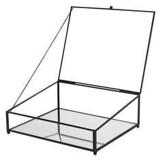 a metal and glass box with a chain hanging from it's bottom half, on a white background