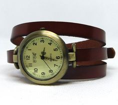 This is a wrap style watch. The case is bronze color metal alloy, free of nickel and lead and stainless steel on back, round 1.25 inches diameter. The wristband is brow leather to wrap around the wrist, 24 inches long, with 6 holes. The buckle is bronze metal color rectangular shape. Thank you. JuSal08 Wristwatch Women, Unique Watches, Star Watch, Watches Women Leather, Watches For Women, Women Watches, Watches Unique, Stylish Watches, Unisex Jewelry