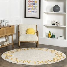 a white chair sitting in front of a book shelf