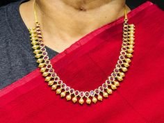 22 karat gold necklace & drop earrings set with rubies & culture pearls - 235-GS3541 - in 39.900 Grams for USD $3,826.87 USD. 
Made in India by Totaram Jewelers Online this product is in Gold - 22 Karat BIS Hallmark 916 Gold  & is an excellent gift for Adult - Women. Ships fully insured with secured guaranteed delivery for free with your order over $250 from New Jersey USA & comes with 30 days exchange policy. Yellow Gold Ruby Kundan Necklace In Temple Jewelry Style, Yellow Gold Ruby Temple Necklace For Celebration, Yellow Gold Kundan Necklace With Ruby In Temple Style, Yellow Gold Kundan Necklace With Ruby For Celebration, Gold Ruby Temple Necklace, Yellow Gold Ruby Kundan Necklace For Celebrations, Festive Yellow Gold Temple Necklace With Ruby, Festive Gold Ruby Temple Necklace, Festive Yellow Gold Kundan Necklace With Ruby