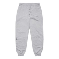 Nike x Drake NOCTA NRG Fleece Pants 'Grey' FN7661-063 Nike Gray Sports Pants, Nike Sports Pants In Gray, Nike Winter Streetwear Pants, Nike Pants For Winter Streetwear, Nike Gray Sweatpants For Streetwear, Gray Sports Sweatpants, Nike Gray Sportswear Sweatpants, Nike Long Pants For Winter, Nike Gray Cotton Sweatpants