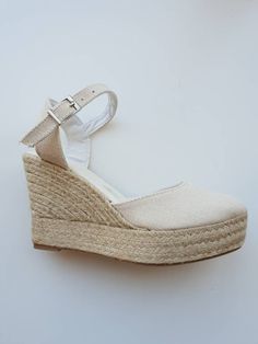 "Ankle strap, rope sole espadrille wedges (7cm heels = 2.76 inches) in IVORY plus a platform (3cm = 1.18i). Aprox height between 10 and 11cm (4.13i). Antislippery soles covered with rubber. Ankle strap with a buckle. 🌿 Eco friendly. Jute fiber has excellent insulating properties and low thermal conductivity. It is environmentally friendly, bio-degradable and recyclable. ♻ SUSTAINABLE PACKAGING, we try to avoid all plastic materials. Discover our complete collection at WWW.MUMICOSPAIN.COM https: Summer Ankle Strap Espadrilles In Natural, Summer Natural Ankle Strap Espadrilles, Natural Straw Ankle Strap Espadrilles, Natural Straw Espadrilles With Ankle Strap, Beige Ankle Strap Espadrilles In Straw, Summer Cream Platform Espadrilles, Casual Natural Color Ankle Strap Heels, High Heel Beige Espadrilles For Summer, Summer High Heel Beige Espadrilles