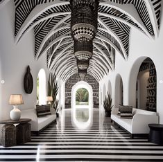 a large room with black and white striped flooring