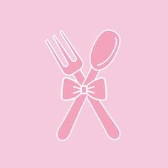 two forks and a spoon with a bow on the end, against a pink background