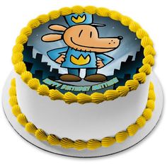 a birthday cake with a cartoon dog on it's top and the words happy birthday