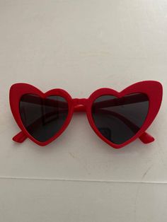 Wedding Retro Heart Red Sunglasses Guests Bachelorette Bridal Party Favor   X Click to Enlarge X X Click to Enlarge Click to Enlarge These red retro heart sunglasses are the perfect wedding or bachelorette party favor.They are stylish and premium in quality and are sure to turn heads. They are plastic sunglasses. Brand new and comes from smoke and pet free home. ITEMS LISTED AS BRAND NEW have not been tried on or handled by shoppers. They are crisp, clean, and brand, brand new. They come from a Red Heart Shaped Glasses, Heart Shaped Sun Glasses, Red Heart Glasses Aesthetic, Red Heart Sunglasses Aesthetic, Lovecore Accessories, Red Sunglasses Aesthetic, Heart Shaped Sunglasses Aesthetic, Heart Glasses Aesthetic, Red Aesthetic Party