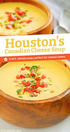 two wooden bowls filled with soup on top of a table