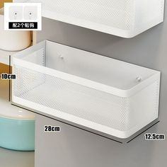 two white plastic containers with holes on the side and measurements for each container in front