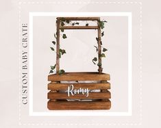 a wooden frame with ivy growing on it and the word kory written in cursive writing