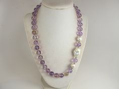 "Chunky amethyst and white pearl statement necklace, multi strand statement purple  necklace, beaded necklace, big violet  beads, amethyst  statement jewelry matching earrings, BEST SELLER Spring 2022 Fashion A bold and dramatic statement necklace featuring genuine amethyst  gemstone  beads and baroque freshwater pearls , medium weight Measurements: 19\" (478cm) plus 4\" extender Contains small parts! Not for children! Choking Hazard! Each piece of jewelry from my shop comes beautifully packaged Elegant Single Strand Amethyst Beaded Necklace, Purple Amethyst Pearl Necklace With Gemstone Beads, Elegant Purple Necklace With Faceted Beads, Elegant Purple Necklaces With Faceted Beads, Purple Amethyst Gemstone Beads Pearl Necklace, Purple Single Strand Pearl Necklace, Purple Pearl Single Strand Jewelry, Purple Pearl Jewelry With Natural Stones, Purple Single Strand Pearl Jewelry