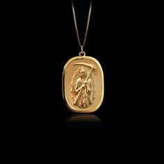 Our Gold Santa Muerte Pendant, crafted in the USA from real solid gold, embodies devotion and protection. This timeless piece showcases exquisite craftsmanship, designed to last a lifetime. Perfect for those seeking a unique and meaningful symbol, this pendant is a testament to enduring quality and elegance. PENDANT INFORMATIONThis pendant is made of real, solid gold.• Made in USA• Material: 14k or 18k solid gold• Finish: polished• Height: 1.24" (31,5 mm) | *includes the small circle, bail dimen Spiritual Yellow Gold Recycled Jewelry, Spiritual Style Yellow Gold Recycled Jewelry, Spiritual Yellow Gold Jewelry In Recycled Gold, Hand Forged Gold Oval Jewelry, Spiritual 14k Gold Medallion Jewelry, Timeless Gold Hallmarked Jewelry, Symbolic Oval Brass Jewelry, Spiritual Gold Plated Jewelry With Polished Finish, Oval Spiritual Jewelry For Commemoration