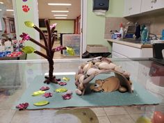 there is a cake made to look like a tree in the middle of a room