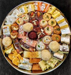 a platter filled with lots of different types of food