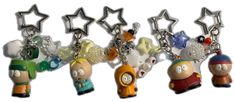 several key chains with cartoon characters attached to them, all in different shapes and sizes