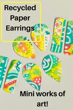 several pieces of paper with the words recycled paper earrings