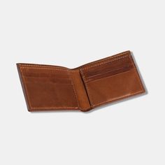 The Gordon Bifold Wallet is the essential billfold to keep your cards and cash secure. Made with our full-grain full-aniline leather, the Gordon Bifold Wallet features six credit card pockets, two interior vertical stash pockets, and one bill compartment to store everything you need. MONOGRAMMING DETAILS: Please note, any Monogram orders placed after Sunday, December 15th will not arrive before Christmas. Add a personal touch to your Wallet with monogramming! You can add 3 letters in a blind sta Sunday December, Organization Gifts, Crossbody Clutch, Best Bags, Bifold Wallet, Bag Organization, Clutch Wallet, Personal Touch, Grain