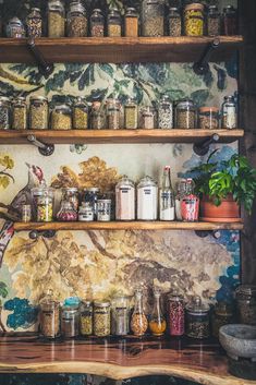 an assortment of spices and condiments on wooden shelves