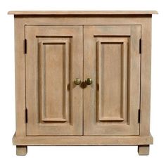 a wooden cabinet with two doors and handles