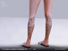 a woman's legs with tattoos and flowers on her leg, in front of a gray background