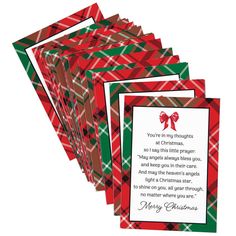 four christmas cards with the words merry christmas written in red, green and white plaid