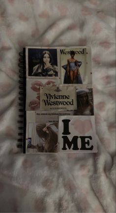 an open notebook with pictures of women on it and the words i me written in black