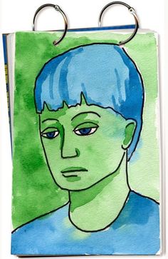 a drawing of a boy with blue hair and green eyes is featured on a card