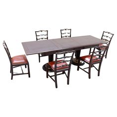 a dining room table and chairs with leather seats on the bottom, set against a white background