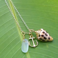 Hebrew Cone Shell, Anchor, and Beach Glass Necklace - Beach Jewelry, Shell Necklace, Hebrew cone shell, Made in Hawaii, anchor necklace by HaoleGirlHaiku on Etsy Hebrew Cone Shell, Pretty Ocean, Beach Glass Necklace, Cone Shell, Necklace Gift Box, Simple Eye, Anchor Charm, Anchor Necklace, Seashell Jewelry