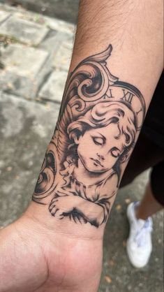 Small Angel Tattoo Men Arm, Torres Tattoo Last Name, Passed Relative Tattoo, Men Tattoo Ideas Drawings, Angel Tattoo For Loved One, Angel On Hand Tattoo, Italian Statue Tattoo, Asthetic Tattoos Mens, Baby Angel Tattoo For Men