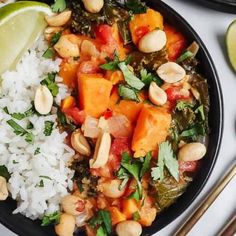 a bowl filled with rice, beans and vegetables