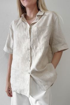 The Nantucket Linen Button Down Shirt in Natural is a perfect shirt to throw over a tank top during the day or wear buttoned at night! Featuring an oversized fit, linen fabric, button down front, natural color, and a front pocket. Style over a basic bot with breezy cotton bottoms! Details & Sizing Oversized fit Linen fabric Functional buttons Natural color Front Pocket Gabriella is wearing a size S Fabric 100% Linen Shipping & Returns THIS CLEARANCE ITEM IS FINAL SALE Beige Linen Shirt With Pockets, Beach Linen Shirt With Buttons, Beige Linen Button-up Shirt, Spring Button-up Flax Tops, Everyday Beige Shirt With Buttons, Summer Linen Shirt In Neutral Color, Neutral Linen Summer Shirt, Summer Neutral Linen Shirt, Beige Linen Beach Shirt