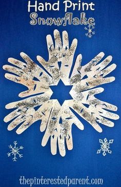 hand print snowflake is shown on a blue background with white snowflakes