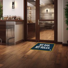 a door mat that says my bar, my rules is on the floor in front of an open glass door