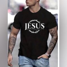 Men’s Black T Shirt With Jesus Logo On It. Available In Small, Medium, Large, Xl, And Xxl Male T Shirts Design, Christian T Shirt Designs Graphics, Christian Shirts Designs Men, Christian Shirts For Men, Mens Christian Shirts, Tshirt Designs For Men, Gospel Clothing, Christian Clothing Men, God Shirts