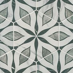 a close up view of an artistic tile design