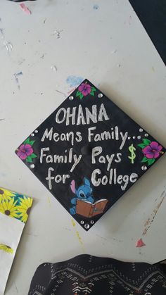 a black and white graduation cap with the words obama means family, family pays for college