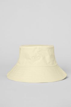 Top off your fave Alo look with the Fundamental Bucket Hat. Anything but basic, this true icon is now designed in an of-the-moment waxed canvas with a shiny finish. The interior sweatband has an adjustable elastic and stopper. It’s sure to become your go-to today and every day. Lemon Ice, Ballet Pink, Yoga Shop, Waxed Canvas, Alo Yoga, Yoga Women, Black Satin, Caps Hats, Bucket Hat